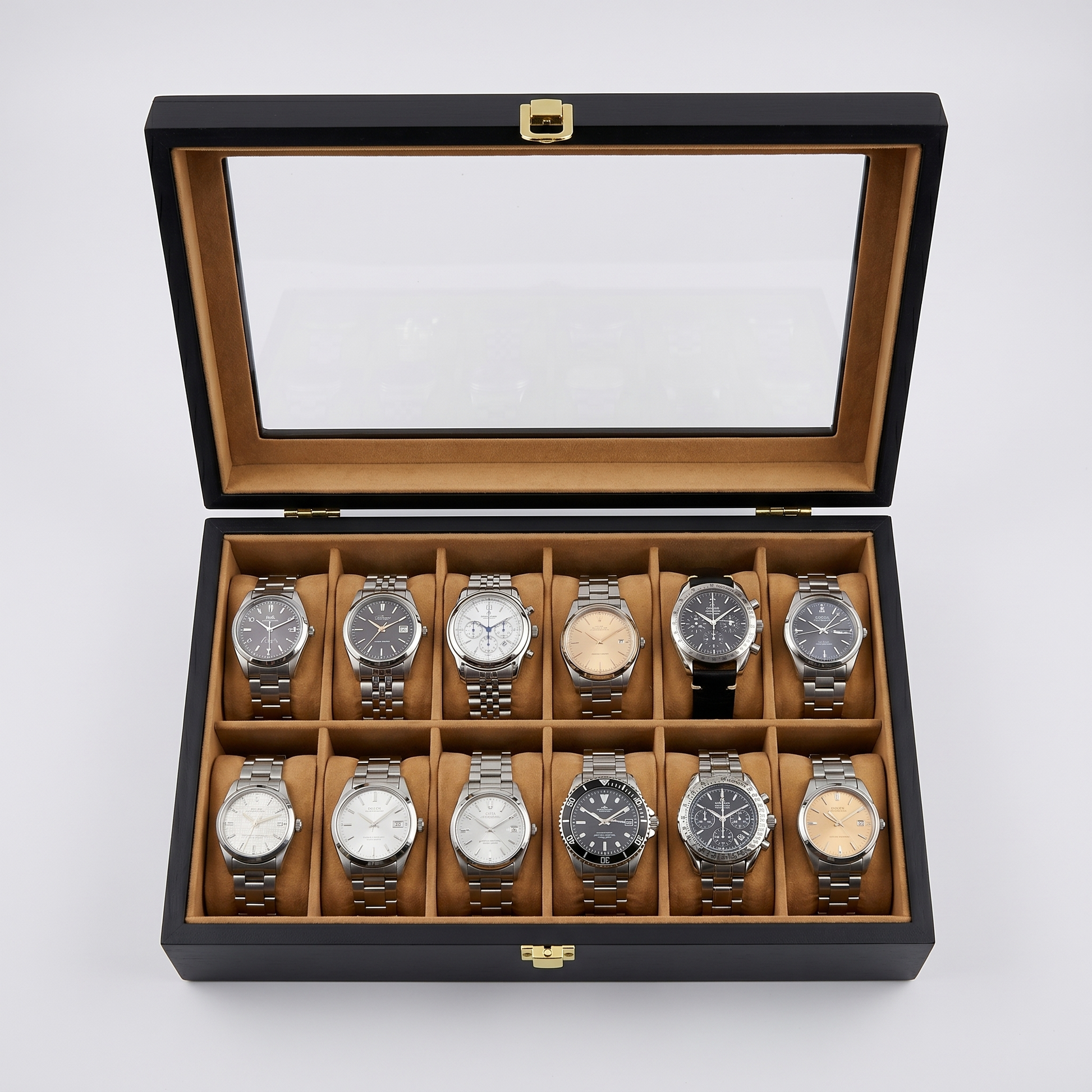 12-slot wood watch box top-down with watches in velvet slots